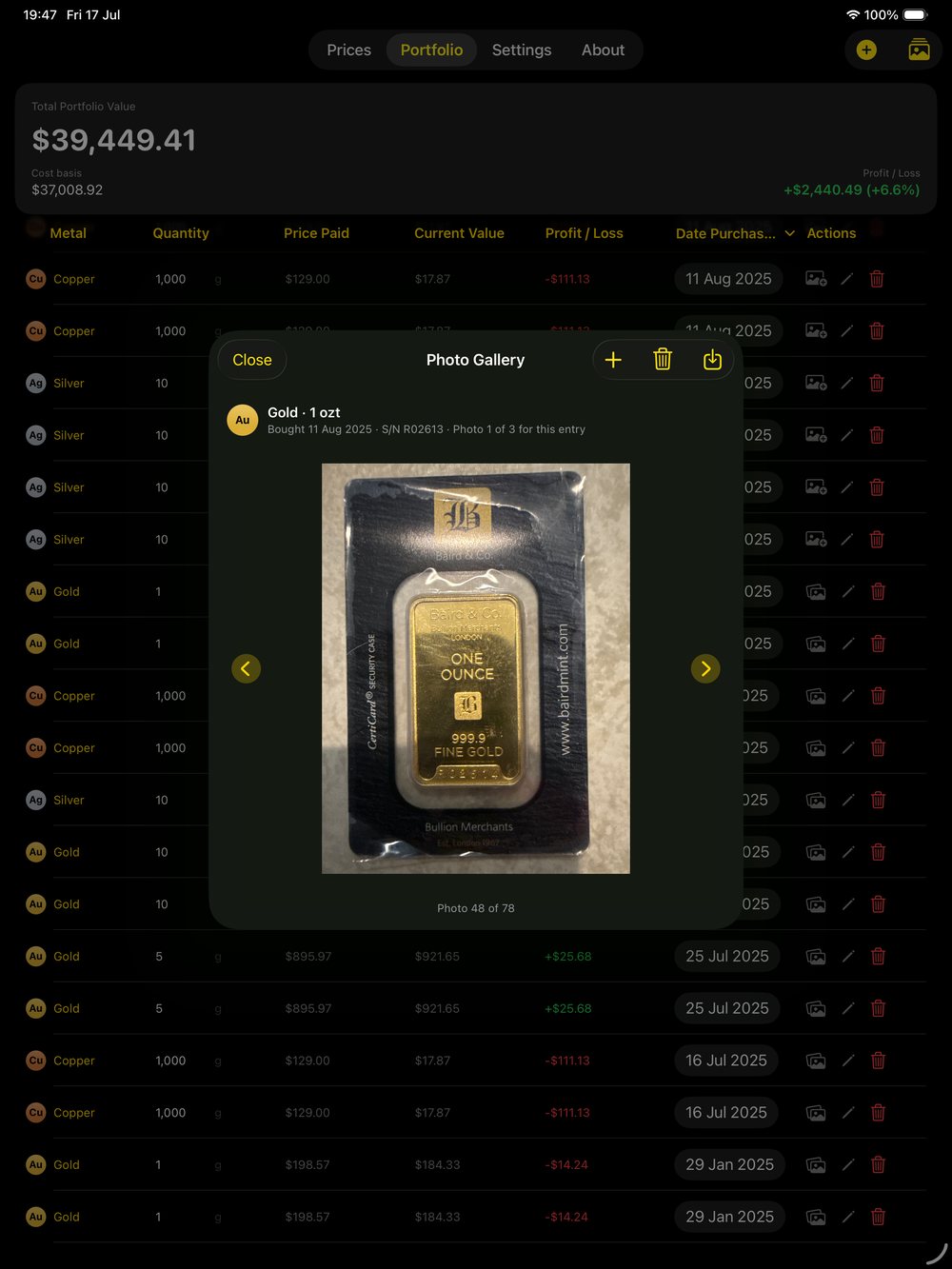 Bullion Keeper on iPad showing the photo gallery for a one-ounce gold bar holding
